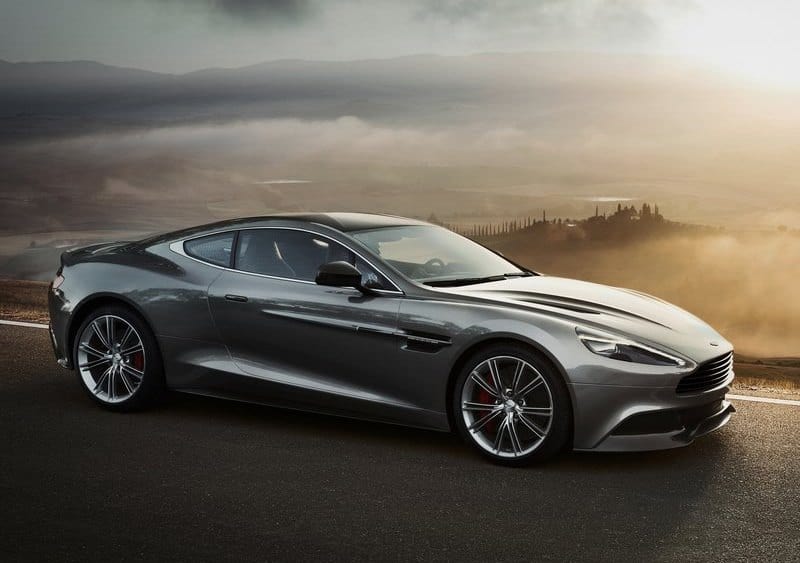 Aston Martin sedan at sunrise