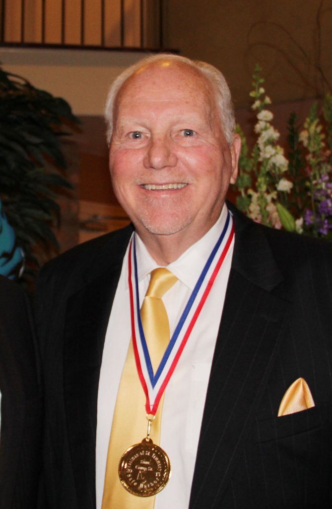 Louisiana College: The $10 Million Donor is... Sam Camp wearing a gold medal
