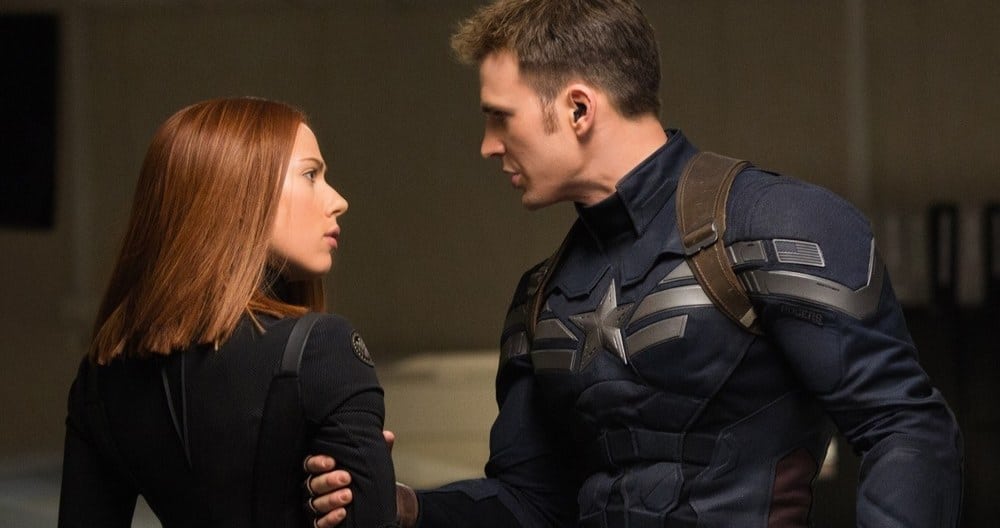 Captain America: The Winter Soldier (An Extended Review) Captain America holding Black Widow by the arm as they look at each other intensely.