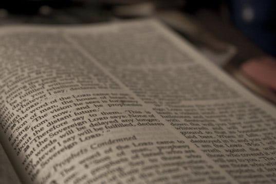 Close-up of an open page of the Bible.