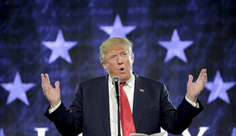 Trump: We need to repent Donald Trump speaking with his hands spread making a point