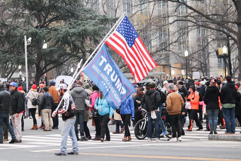 Evangelical who prophesied Trump 2020 win closing ministry to diffuse division Waving Trump Flag- Joe Flood