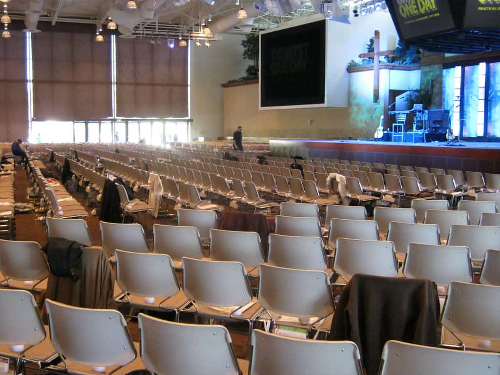 Saddleback leader makes wife ‘teaching pastor’ an auditorium with stage as seen from the back