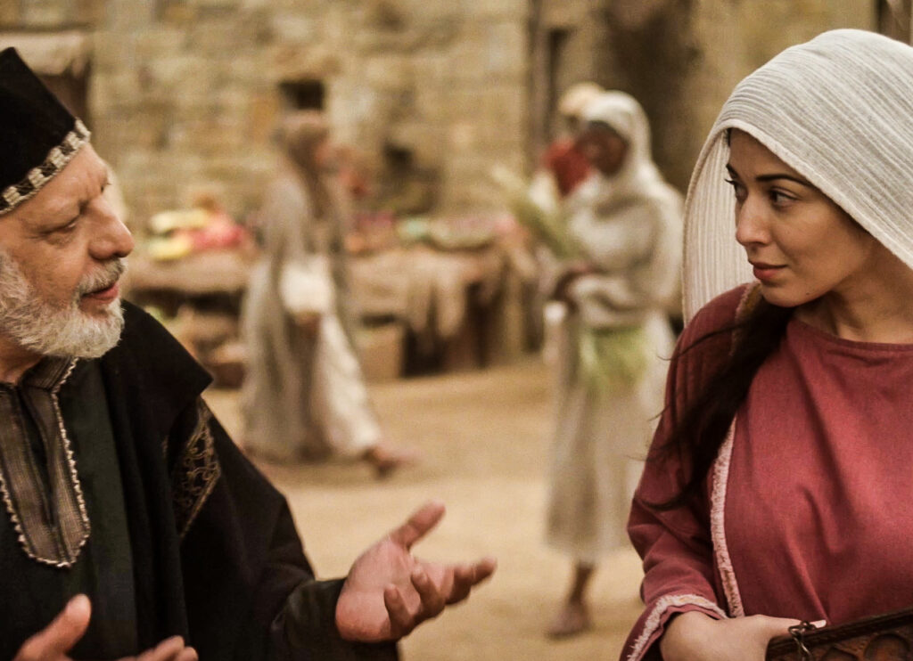 'The Chosen' actress says series opened her heart up to Jesus and the Gospel a man and women in middle eastern costume are opposite each other and in conversation