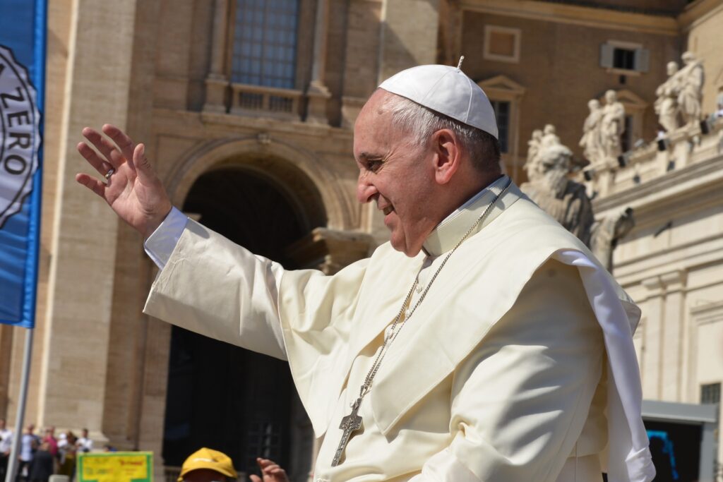 Pope Francis becomes first Pope to visit Bahrain a side photo of the Pope greeting a crowd