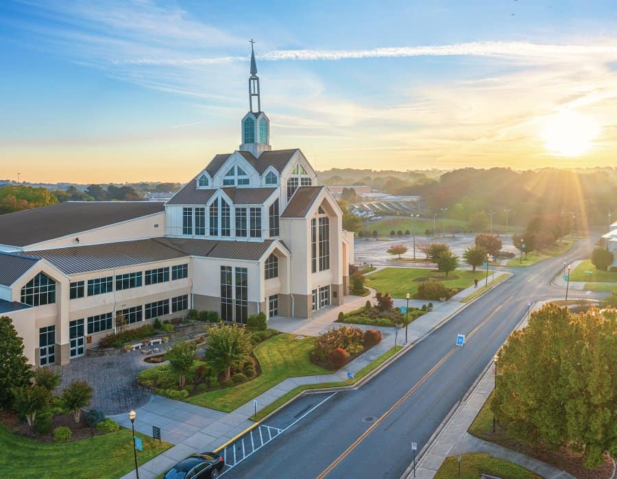 Architecture, Theology, and Poetry: Reflecting on the Church and Her Buildings View of North Cleveland Church of God as seen from above at sunrise