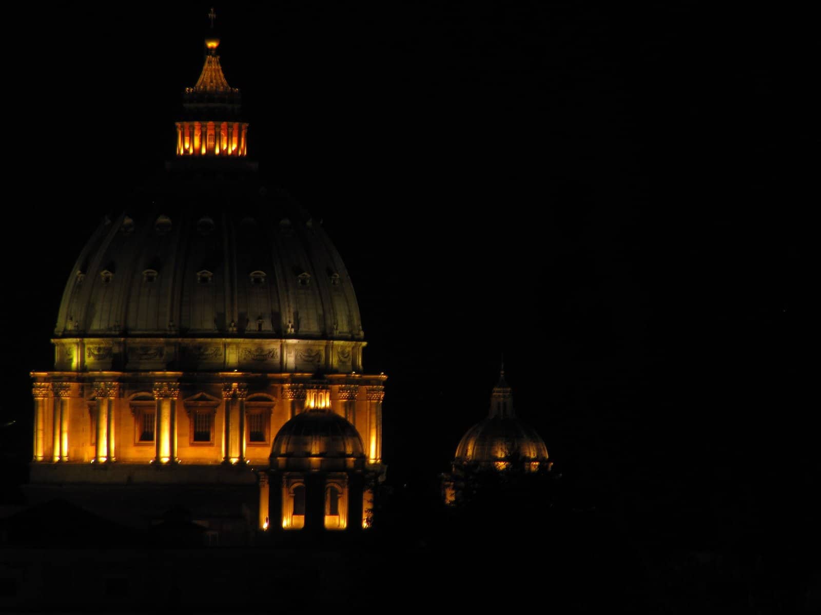 A night image of a dome in Rome.