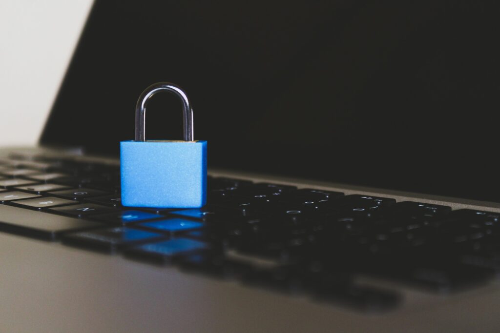 Email scam robs $793K from church, halts building construction A blue padlock is shown sitting on the keyboard of a laptop.