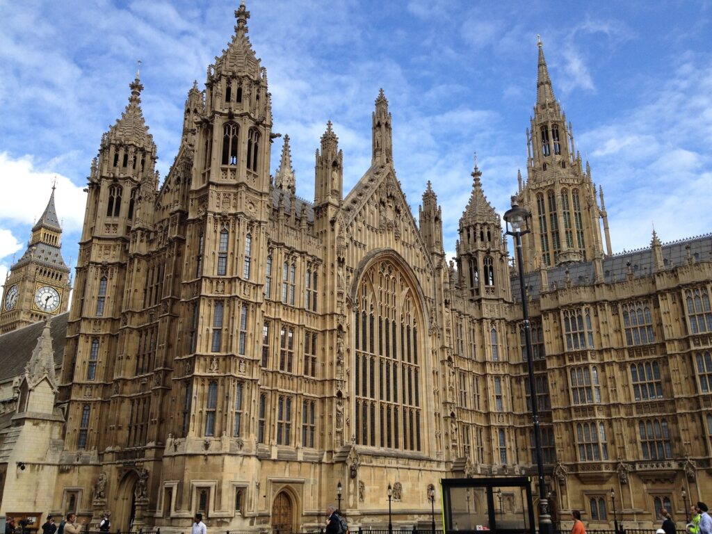 Most Brits say churches and chapels important for society: Study A portion of Westminster Abby is shown from the street with no surrounding sidewalk or buildings in the photo.