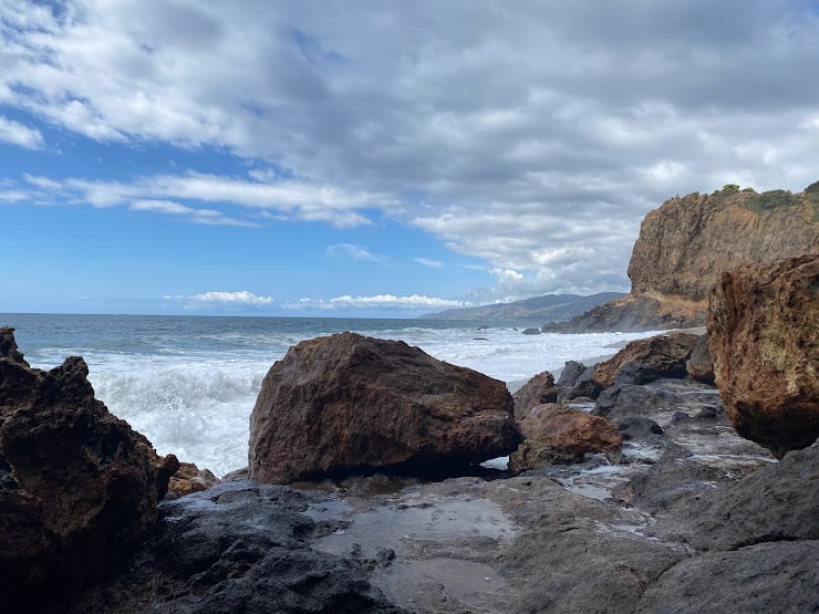85-year-old man gets baptized at Greg Laurie's event, surprising family Pirate's Cove Beach in Malibu with rock formations is seen as one looks out to the ocean.