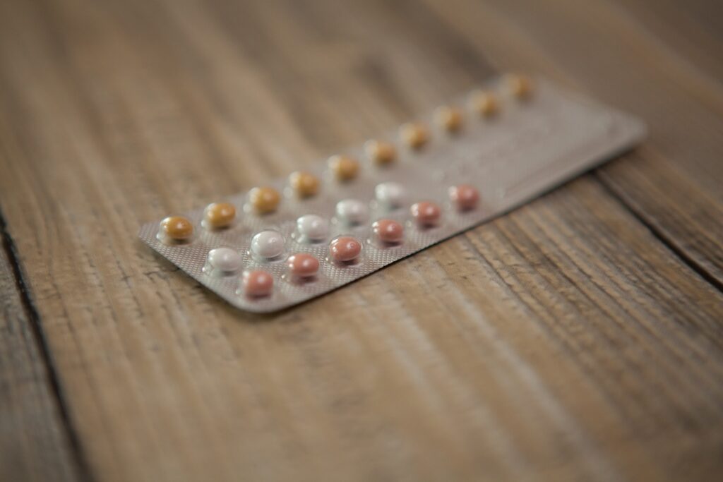 FDA approves first prescription-free birth control pill Three rows of brown and white pills in a blister pack is shown.