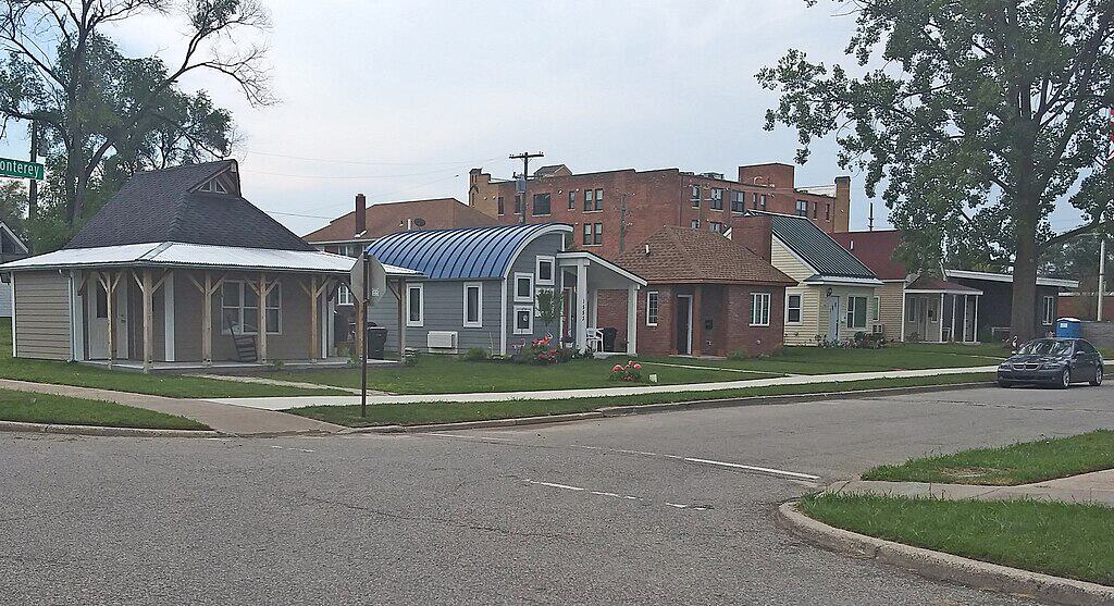 Tiny houses, big impact: Minnesota's innovative approach to homelessness A row of tiny homes on a street.