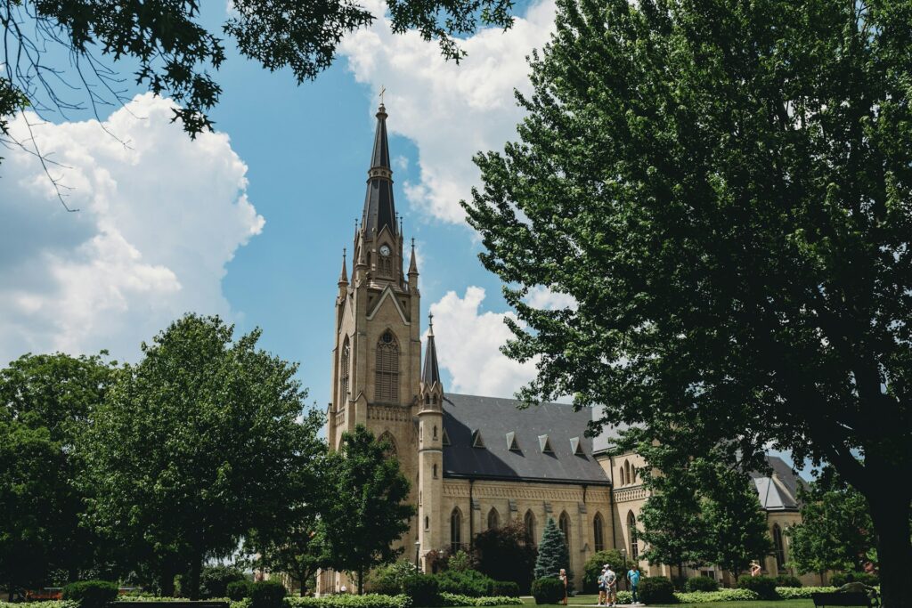 The inauguration of Notre Dame's new president, Father Robert A. Dowd Wide Shot of the Basilica of the Sacred Heart at the University of Notre Dame through the trees