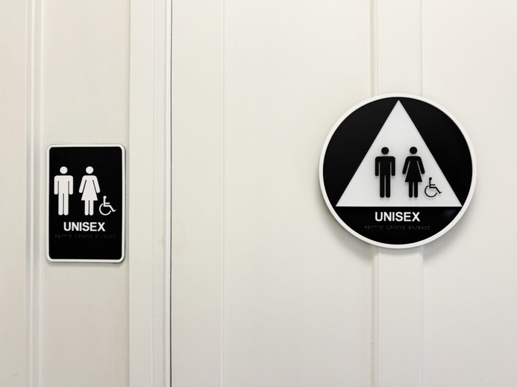 Senate Bill 104: Ohioโs new single-sex bathroom law explained Unisex bathroom sign on a white door.