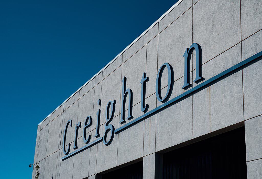 Signage along I-480 for Creighton University in Omaha, Nebraska.