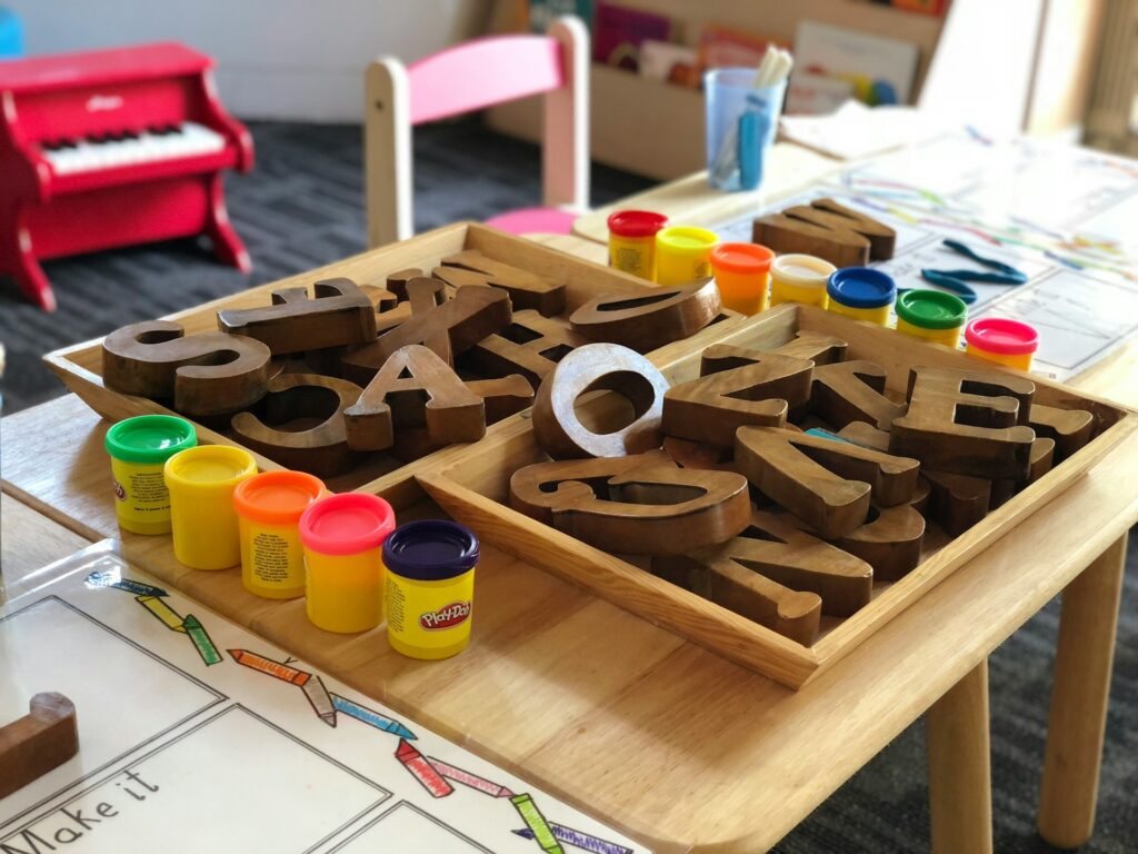 Colorado Christian school secures victory in universal preschool case A preschool classroom with block letters and playdoh.