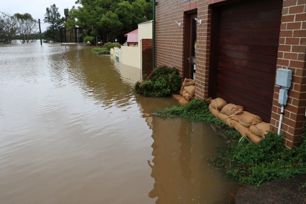 Texans on Mission brings urgent relief after historic Rio Grande Valley flooding A house is sandbagged against flooding.