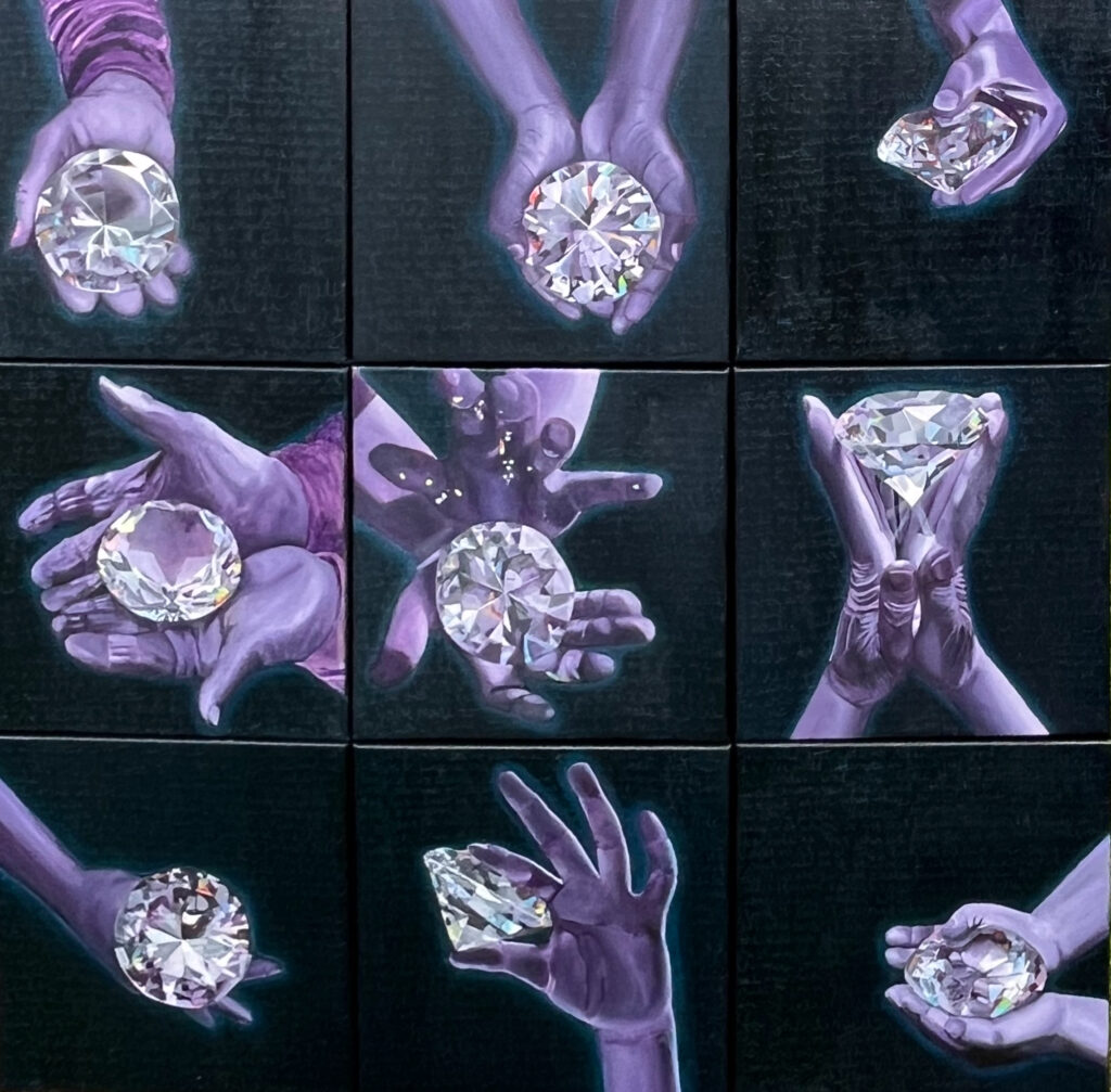 Hands holding diamonds