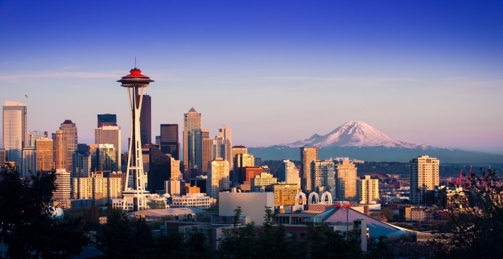 Tensions erupt at Seattle prayer rally as protesters clash Seattle skyline with the Space Needle.