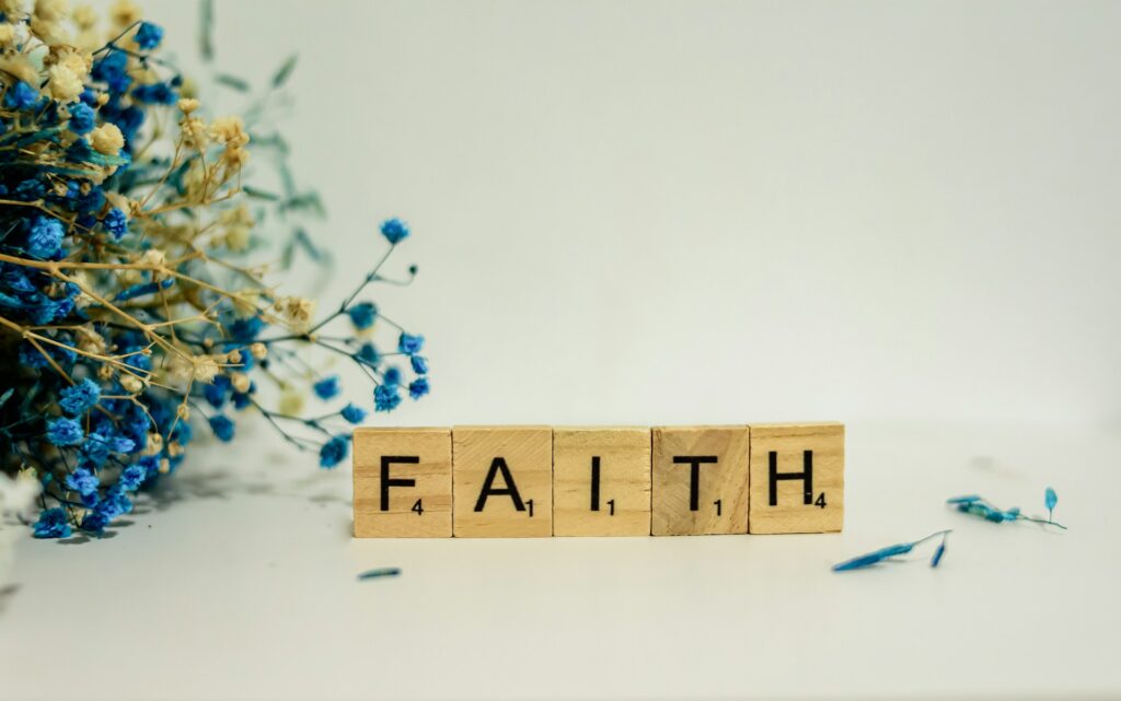 Faith spelled with Scrabble tiles