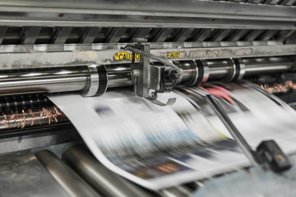 Wes Campbell faces $5.4M lawsuit as Newsboys dropped by label Newspaper being printed quickly on a printing press.
