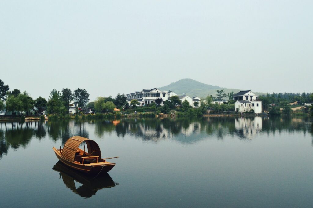 A river in China with a boat on it.
