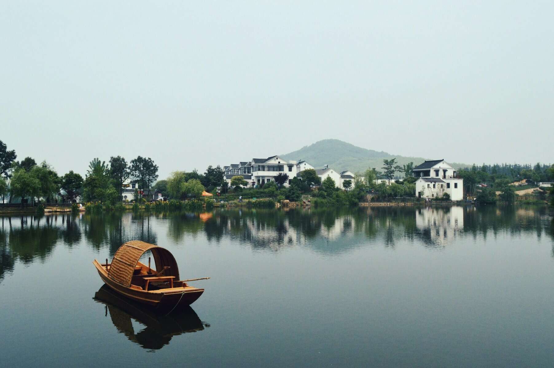 A river in China with a boat on it.