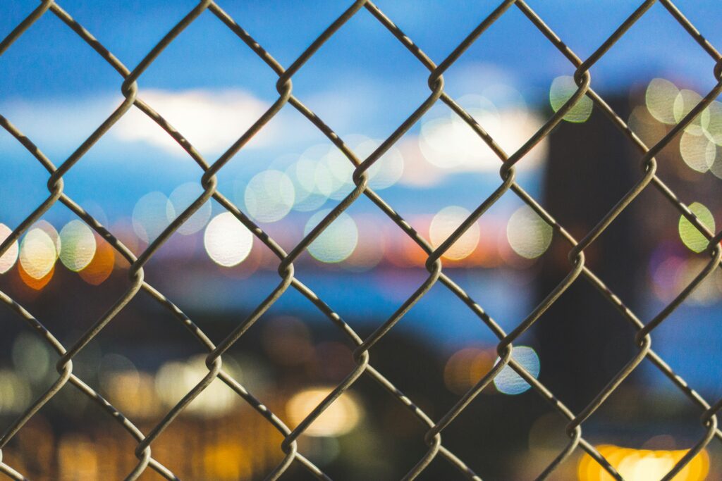 Petition efforts stall eminent domain plan in Toms River A chain link fence with a blurred background.
