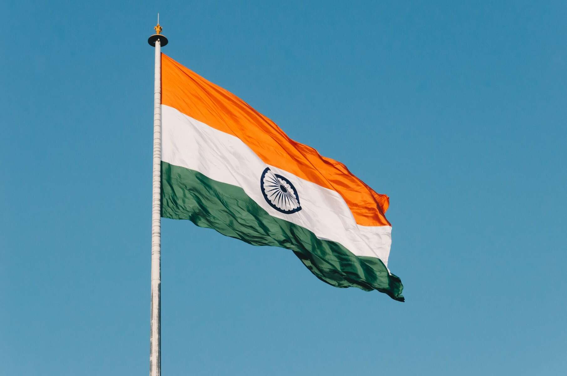 The Indian flag on a pole.