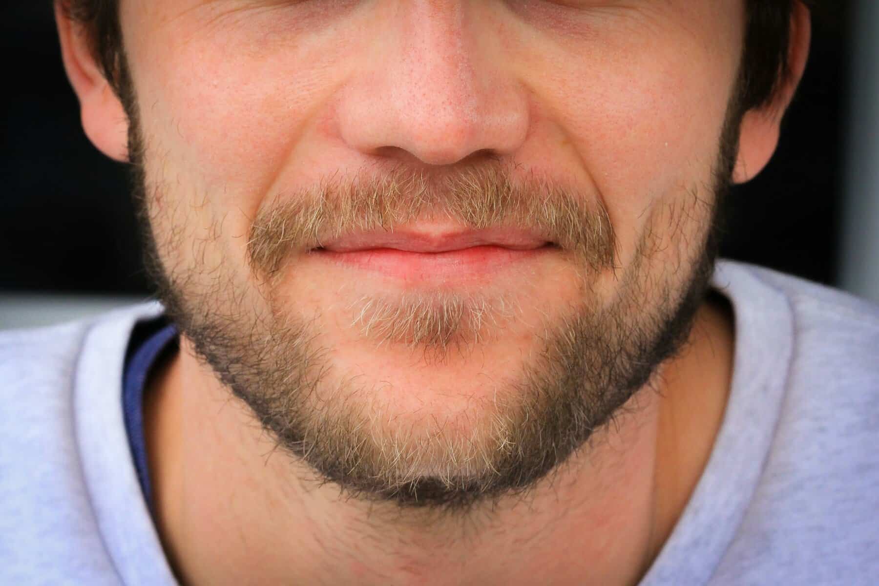 Lower half of a white man's face.
