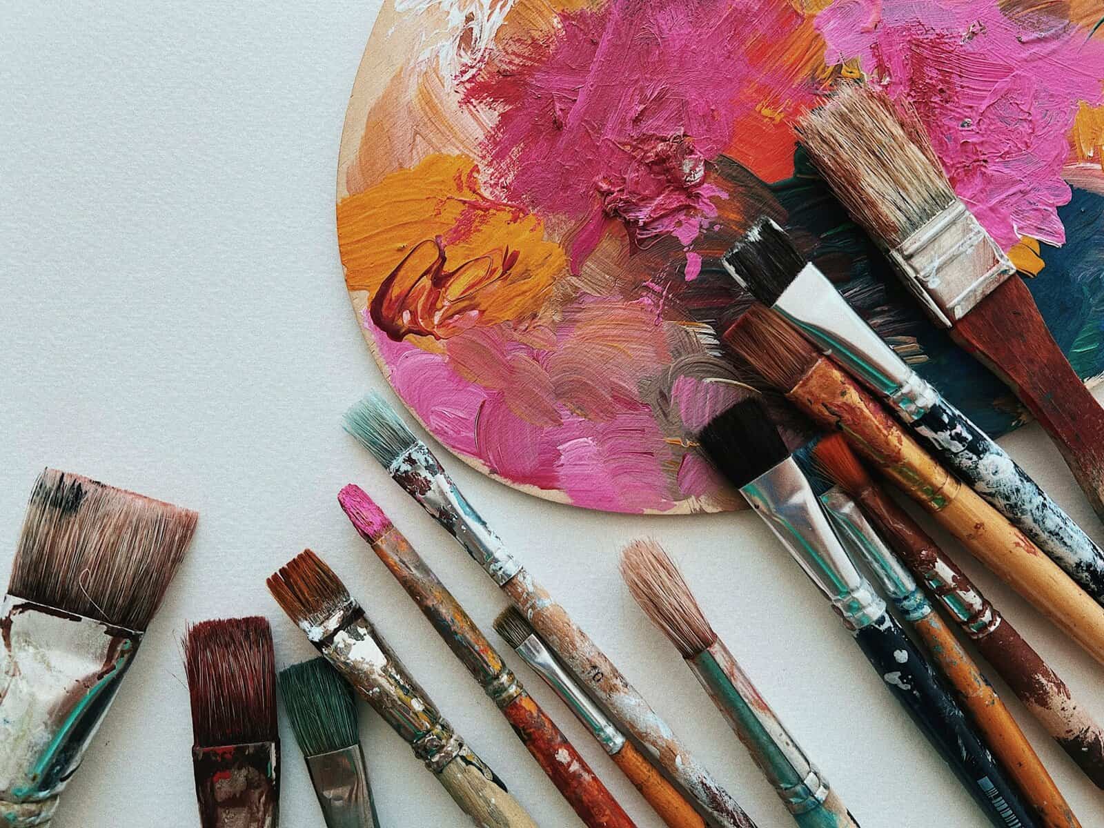 paint brushes and a palette