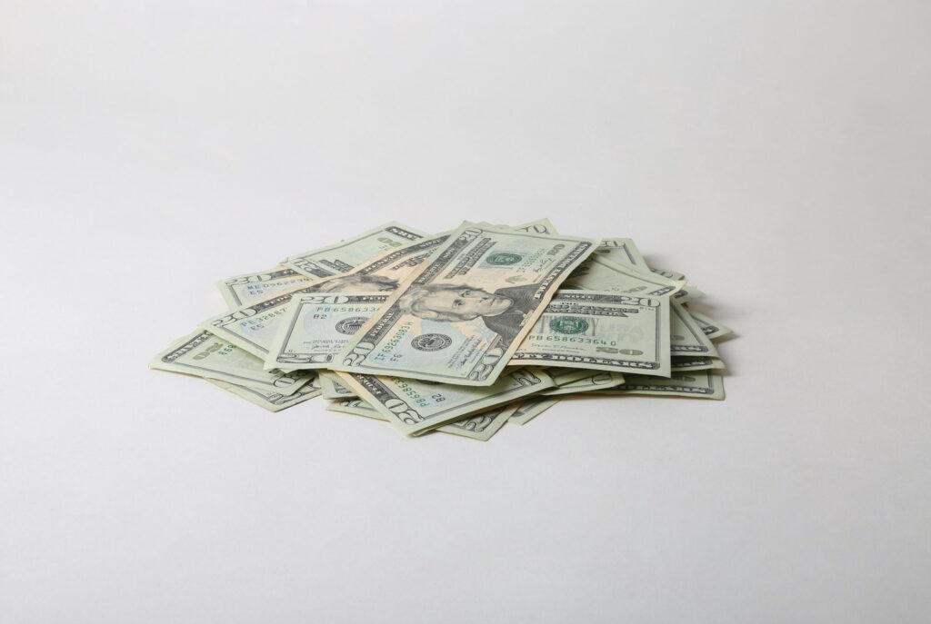 A pile of US $20 bills.