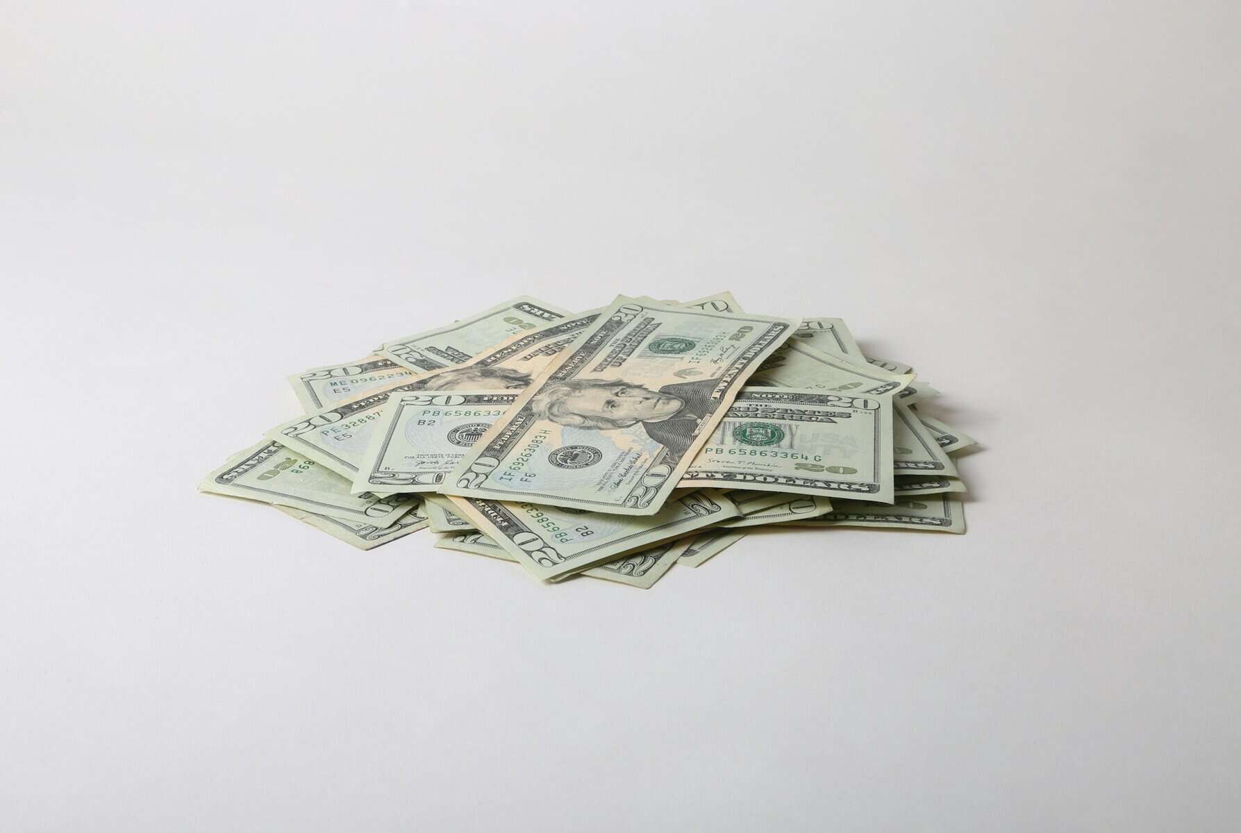 A pile of US $20 bills.