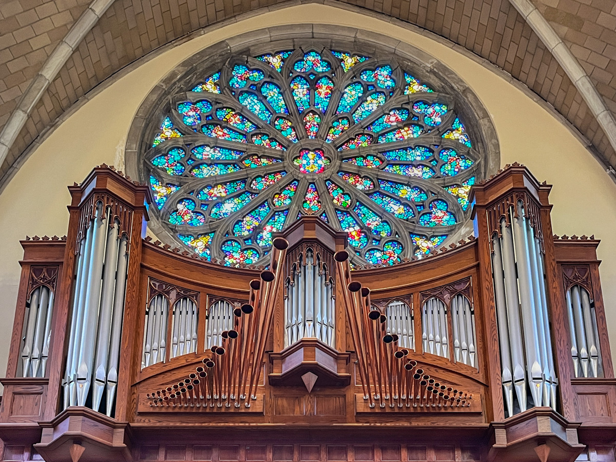 Lessons and Carols at Sewanee: Tradition meets diversity in Advent worship All Saints Sewanee rose window and organ pipes.