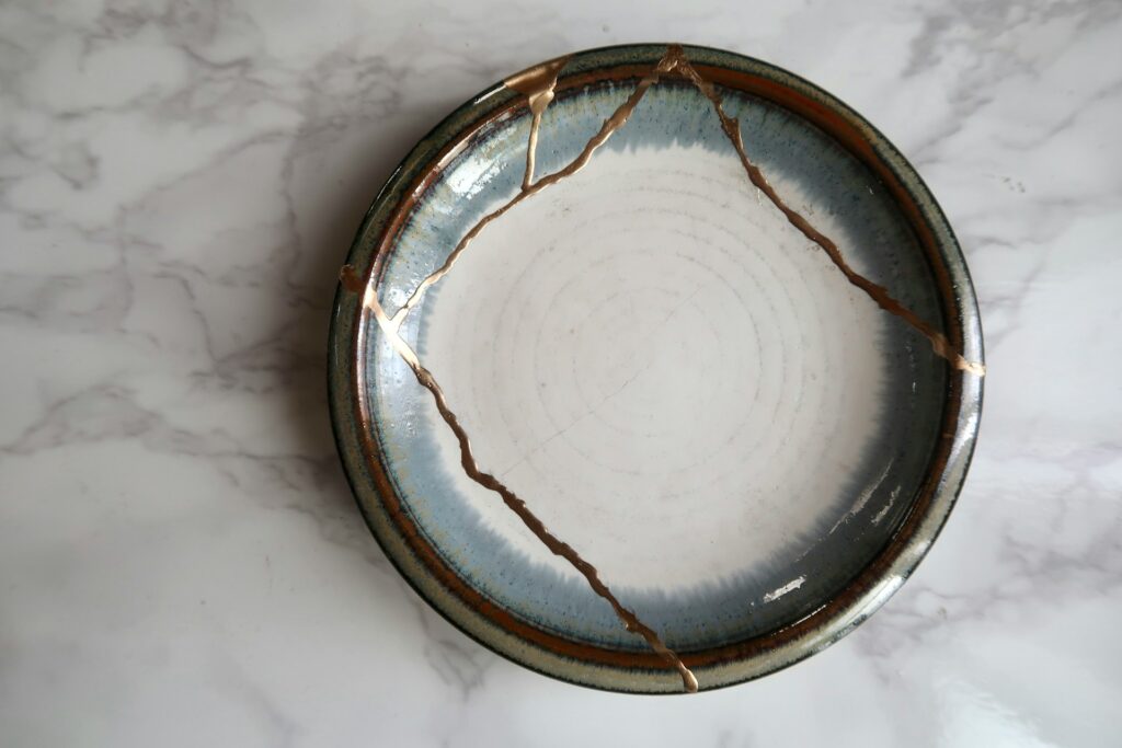 We Mend with Gold: Stirring Kintsugi faith for immigrant belonging A Japanese plate mended with the Kintsugi technique.